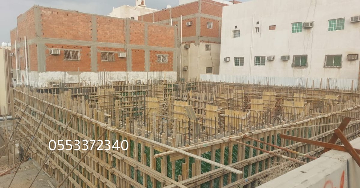 صورة جوية لحي المحمدية بجدة مع مشاريع بناء تحت إشراف مقاول معماري معتمد.